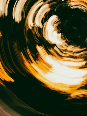 Abstract image of light trails creating a rhythmic pattern.